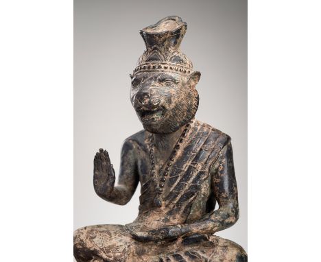 A BRONZE FIGURE OF THE TIGER HERMIT SERMING PRAI 19TH CENTURYThailand, Rattanakosin Kingdom (1782-1932). Finely cast, seated 