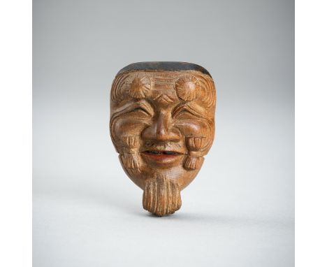 A WOOD MASK NETSUKE OF OKINA (HAKUSHIKIJO), 19th CENTURYJapan, 19th century The Okina (Old Man) mask, carved and stained in a