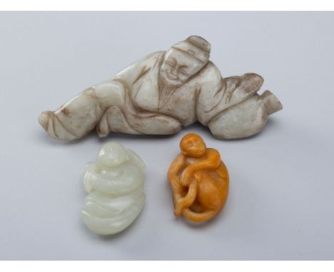 A GROUP OF THREE JADE PENDANTS AND FIGURES, 19TH CENTURYChina, late Qing Dynasty (1644-1912). One depicting the Chinese poet 