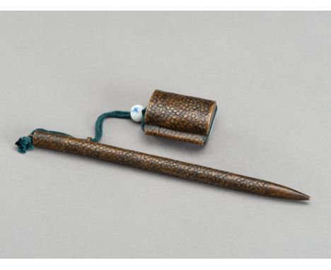 A BRASS PEN SHAPED YATATE, MEIJIJapan, 19th century, Meiji Period (1868-1912). The yatate comprising a fudezutsu (brush holde