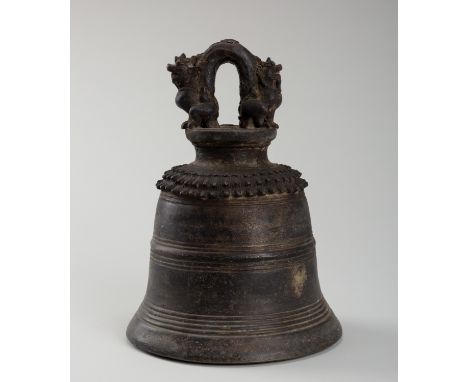 A HEAVY BRONZE TEMPLE BELL, 19TH CENTURYBurma, 19th century. Heavily cast with multiple raised horizontal bands encircling th