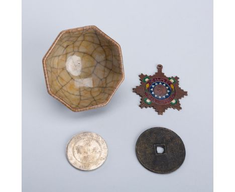 A GROUP OF FOUR CHINESE ITEMS, c. 1920sChina, late Qing Dynasty (1644-1912) to Republic period (1912-1949). The first an anti