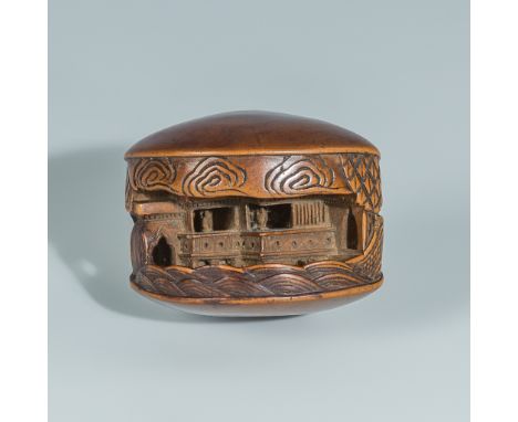 MITSUNOBU: A WOOD NETSUKE OF THE CLAM'S DREAMBy Mitsunobu, signed Mitsunobu 光信Japan, 19th century, Edo period (1615-1868)Beau