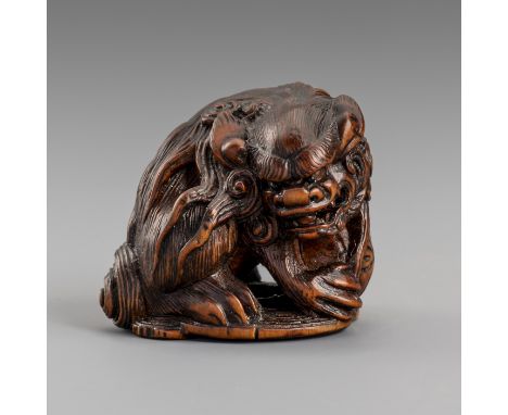 MASATOMO: A BOXWOOD NETSUKE OF A SHISHI LION, EDO PERIODBy Masatomo, signed Masatomo 正友Japan, 19th century, Edo period (1615-