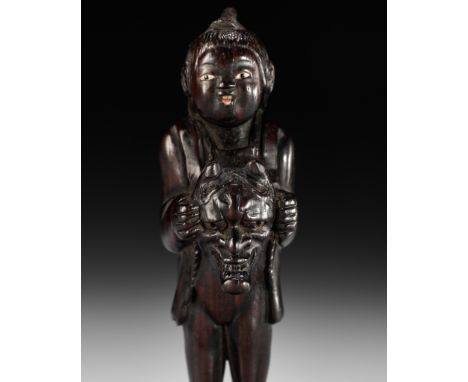 MIWA I: A SUPERB WOOD NETSUKE OF A BOY WITH HANNYA MASKBy Miwa I, signed Miwa 三輪 with sealJapan, Edo (Tokyo), 18th century, E