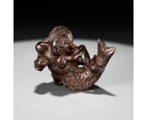 TAKUSAI: A SUPERB WOOD NETSUKE OF A MERMAID (NINGYO)By Tachikawa Takusai (1817-1887), signed Takusai 啄齋Japan, Suwa, Shinano P