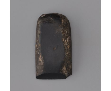 A JADE AXE, FU, NEOLITHIC PERIODChina, Neolithic period, c.2500-2000 BC. Of rounded rectangular form, with convex sides thinn