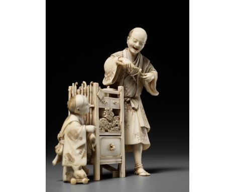 ICHIYOSAI SOKO: A RARE IVORY OKIMONO DEPICTING A KISERU (PIPE) MAKER WITH HIS SONBy Ichiyosai Soko (Munehiro), signed Ichiyos