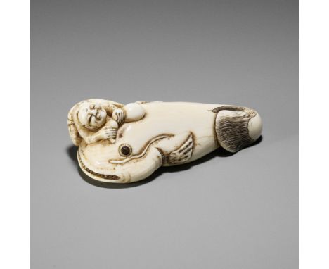 AN IVORY NETSUKE OF KADORI MYOJIN WITH NAMAZUJapan, early 19th century, Edo period (1615-1868)Carved as Kadori Myojin sitting