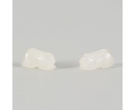 A PAIR OF MINIATURE RABBITS, LATE QINGChina, late Qing dynasty (1644-1912). Each modeled as a compact figure of a recumbent r