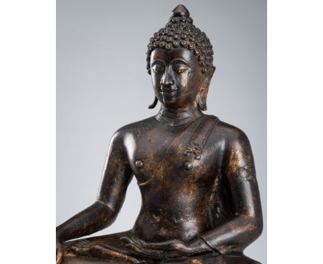 A BRONZE FIGURE OF BUDDHA SHAKYAMUNI, SUKHOTAI STYLEThailand, style of the Sukhothai Kingdom - 19th century. Seated in dhyana