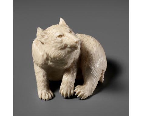 TOMOKAZU: A SUPERB IVORY OKIMONO OF A BEARBy Okada Tsunekichi (art name Tomokazu), signed TomokazuJapan, Meiji period (1868-1