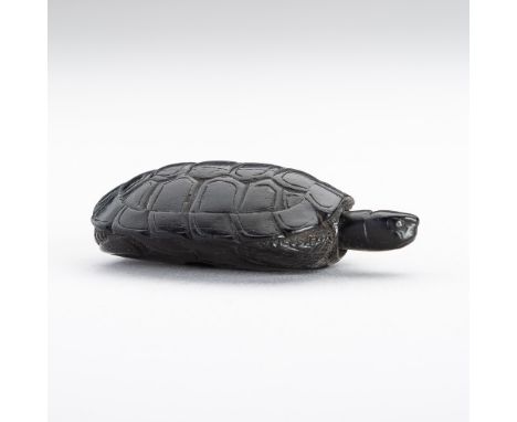 A WOOD NETSUKE OF A TORTOISEJapan, Meiji period (1868-1912)Boldly carved as a tortoise with its legs and tail completely retr