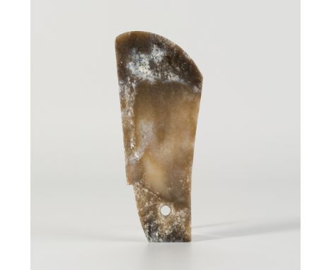 A JADE AXE, QIJIA CULTUREChina, Qijia culture, c. 2200-1600 BC. Of tapering form with a curved edge, pierced with a circular 