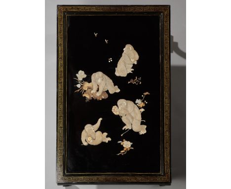 A FINE ANTLER AND MOTHER-OF-PEARL INLAID BLACK-LACQUER LOW TABLE WITH FROLICKING MONKEYSJapan, Meiji period (1868-1912)Of rec