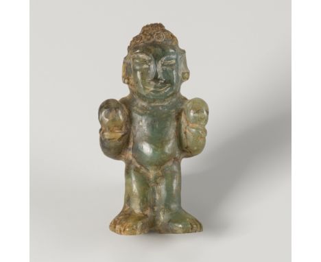 A SERPENTINE AMULET OF A BOY, c. 2000 YERS OLDCentral Asia, presumably c. 2500 years old. Carved as a standing naked young bo