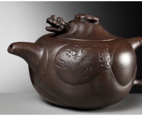 A YIXING STONEWARE 'DRAGON AND CARP' TEAPOT AND COVER, BY WANG YUYING, REPUBLIC PERIOD 民國宜興龍魚茶壺，王玉英款China, 1912-1949. Finely 
