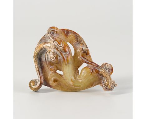 A JADE 'CHILONG' ORNAMENT, XI, QING OR EARLIERChina, Qing dynasty (1644-1912) or earlier. The sinous dragon splayed on its be
