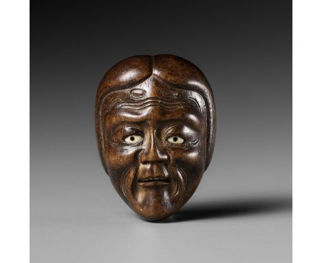 SHUGETSU: A FINE WOOD MASK NETSUKE OF YASE-ONNA (EMACIATED WOMAN)By Shugetsu, signed Shugetsu saku with sealJapan, Edo (Tokyo
