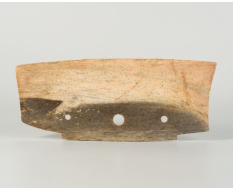 A JADE CEREMONIAL AXE, QIJIA CULTUREChina, Qijia culture, c. 2200-1600 BC. The blade with curved and slanted edges, well carv