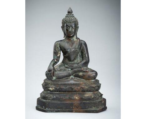 A BRONZE FIGURE OF BUDDHA SHAKYAMUNI, THAILAND, 17TH-18TH CENTURYSeated in dhyanasana on a double lotus base with beaded uppe