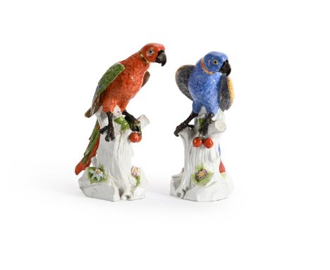 A LARGE PAIR OF CONTINENTAL PORCELAIN PARROTS  AFTER THE MEISSEN MODEL, CIRCA 1900 With bold polychrome decoration to the fea