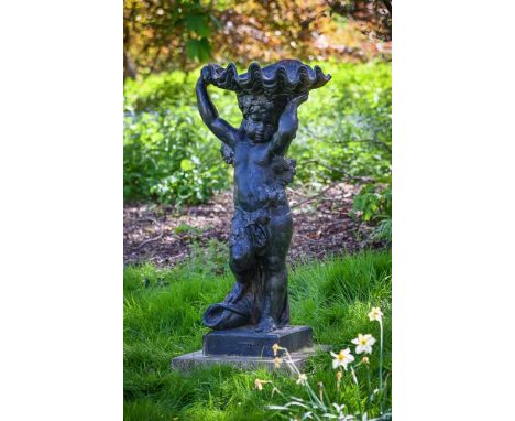 A FRENCH CAST IRON FIGURAL FOUNTAIN CAST BY ANTOINE DURENNE  CIRCA 1870  Modelled as Bacchic child holding a clam shell basin