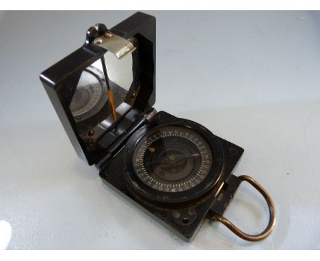 Military Issue magnetic marching compass Mark 1. Serial No. B99686 by T G Co Ltd.