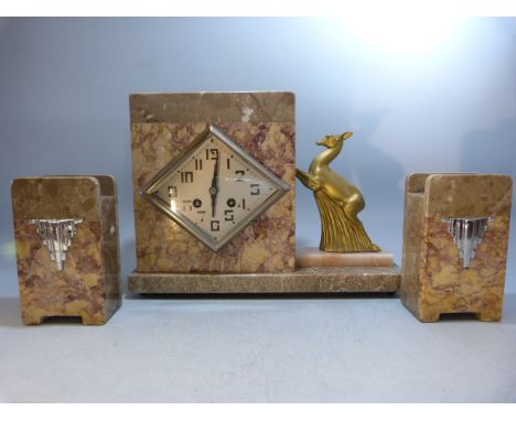 'Japy Freres 'Art Deco mantle clock with Garniture. Brass coloured deer to side with damage to one ear. 