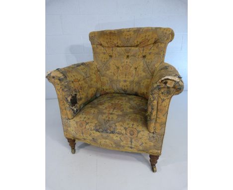 Antique tub style button back armchair on turned wooden legs