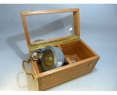 Sestrel Radiant hand - held naval compass of circular form by Henry Browne and Son Ltd Serial no 000024. in original fitted c