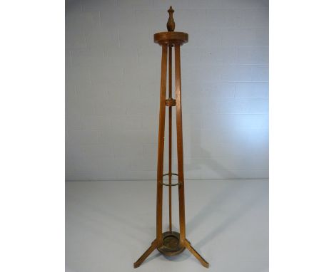 Unusual oak hat stand in the french style on tripod base. Stick and umbrella stand to base with brass loop ring leading to a 