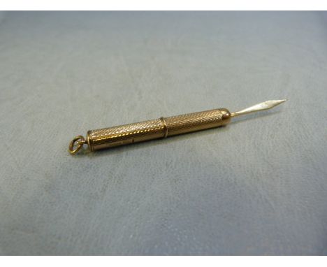 A 9ct gold propelling tooth pick, 5.7g maker R&R
