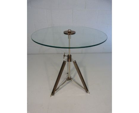 Tripod glass topped coffee table