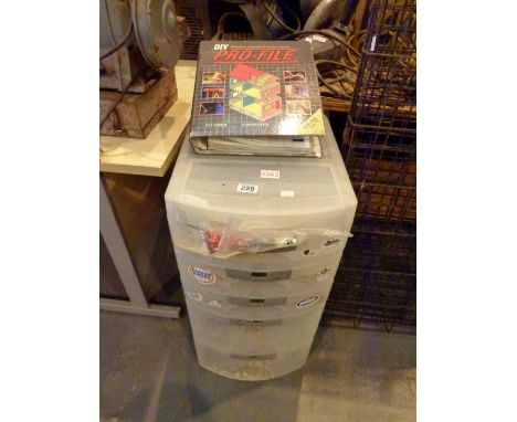 Five drawer plastic chest containing tools