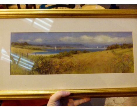 Framed print of lakeside scene