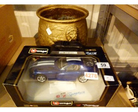 Two model cars, a Burago viper GTS and a coal Jaguar E-Type