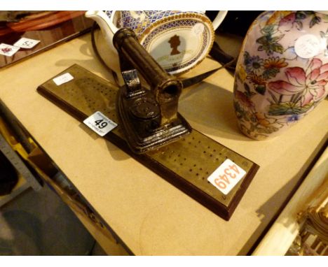 Brass topped Cribbage score board and an icon