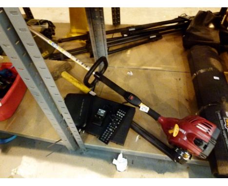 Collection of tools including sledgehammer and strimmer 