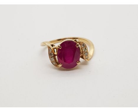 An 18K Yellow Gold Burmese Ruby (4ct) and Diamond Ring. Size O. 3.75g 