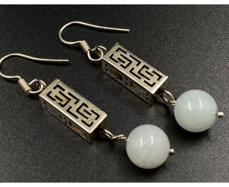 A pair of white jade drop earrings, 36mm in length 