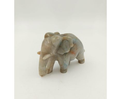 A Jade stone carved as elephant figurine, 8cm in height. 