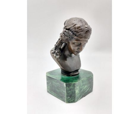 A French Bronze Bust on a Malachite Base. Signed by the sculptor. 15.5cm tall. 