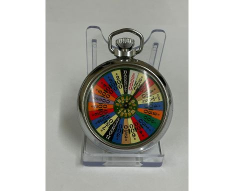 Vintage spinning gaming pocket watch ( working) sold with no guarantee 