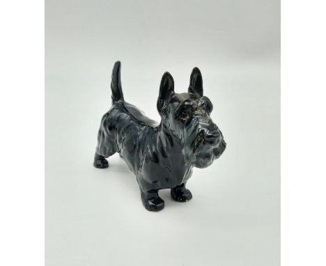 A Vintage Royal Doulton Porcelain Scottish Dog.12.5 x 9cm. 