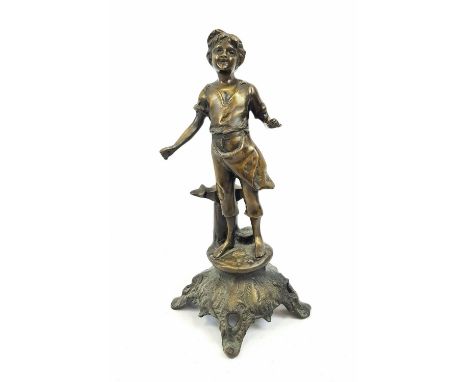 An Antique Bronze Statue of a Cobblers Apprentice.45cm tall. A/F 