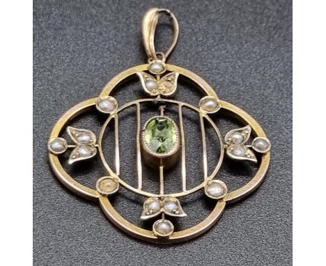A Vintage 9K Yellow Gold Brooch with Seed Pearls and a Peridot Centre Stone. 3 x 3cm. 2.84g 