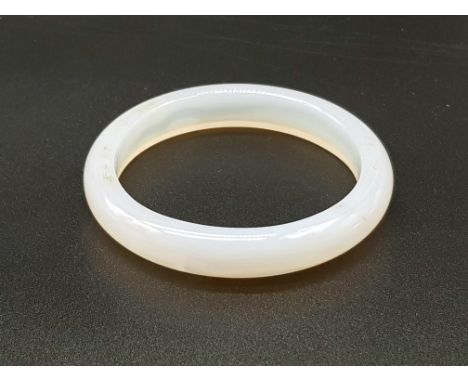 A white jade bangle, diameter 68mm, small hands only!! 