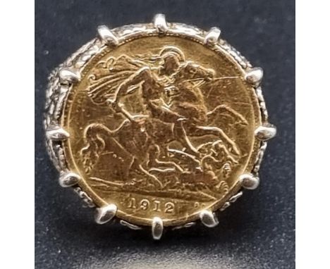 9ct gold half sovereign ring dated 1912. Ring size R, total weight 8.77 grams. 