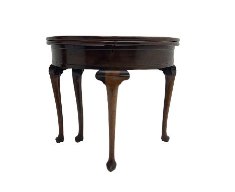 Early 20th century walnut demi-lune side table, fold-over top with hinged storage compartment, on cabriole supports with poin